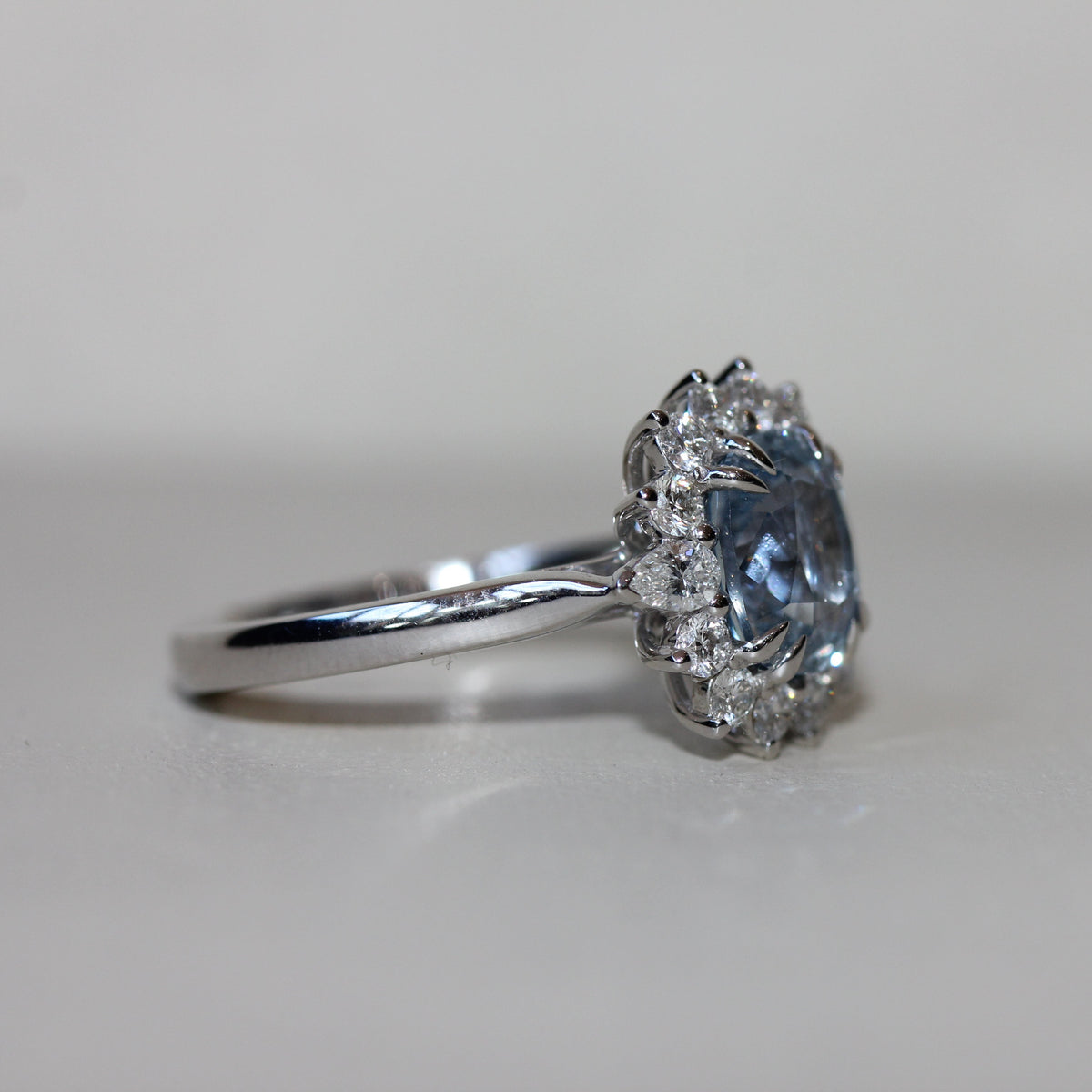 2.70CT LIGHT BLUE SAPPHIRE & DIAMOND HALO RING